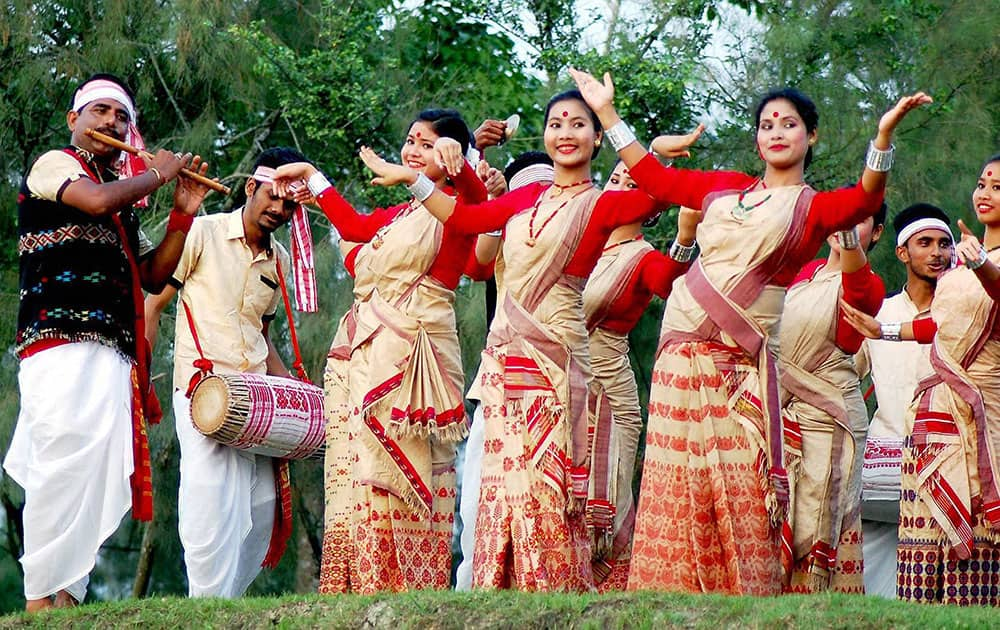 Aartist perform Bihu dance on the eve of Rongali Bihu