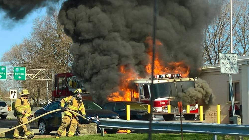 flames engulf a firetruck