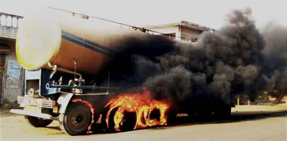 A cement tanker smoke blow after catch fire