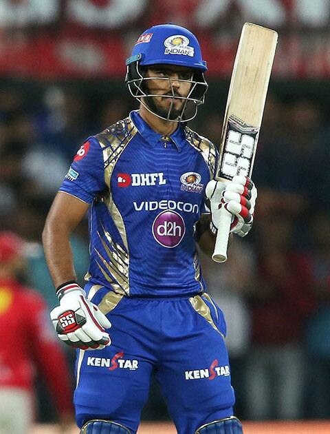 Nitish Rana of the Mumbai Indians celebrates his half century during match IPL