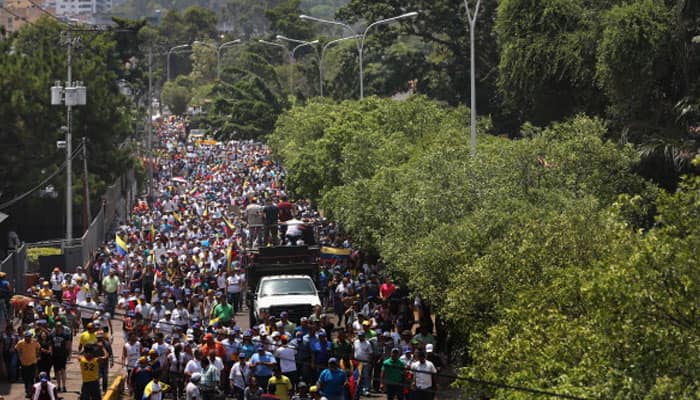 Seeking to keep up pressure, Venezuela opposition plans more protests; toll rises to 9 