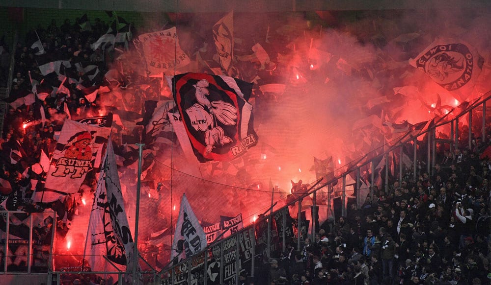 Frankfurt supporters burn fireworks