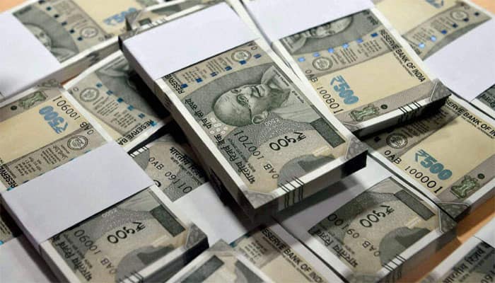 Rupee at fresh 21-month high of 63.98 against dollar