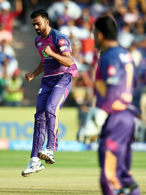 Jaydev Unadkat celebrates the wicket of Travis Head