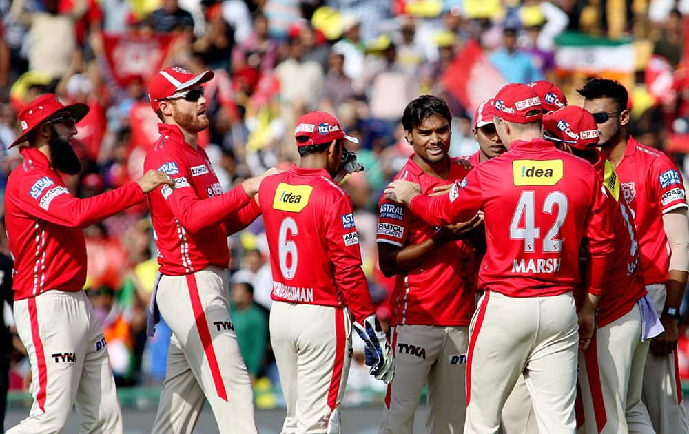 Sandeep Sharma celebrating with his teammates the wicket batsman Sanju Samson