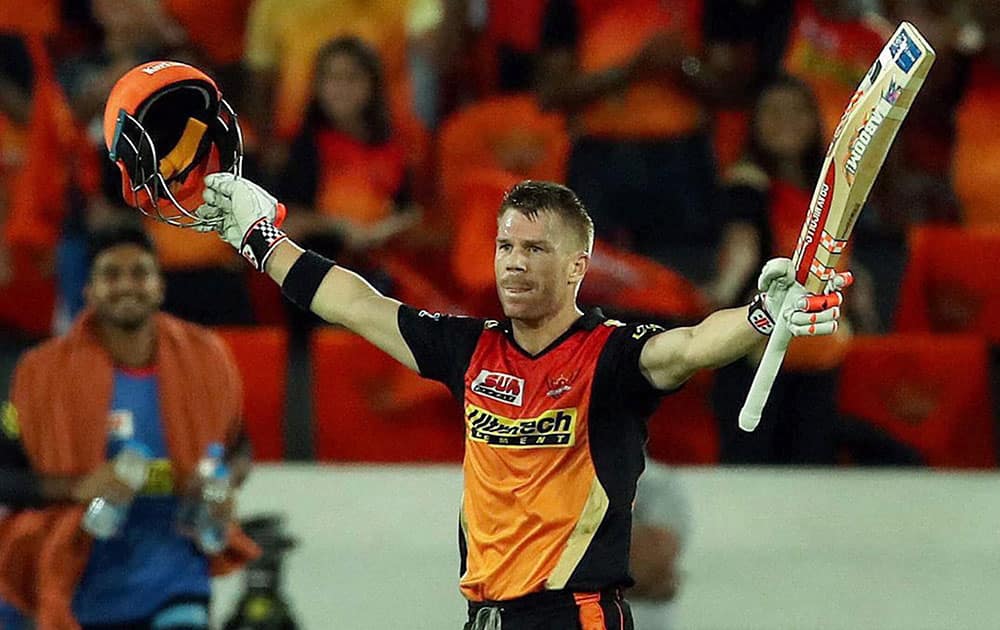 David Warner celebrates his century during their IPL match against Kolkata Knight Riders