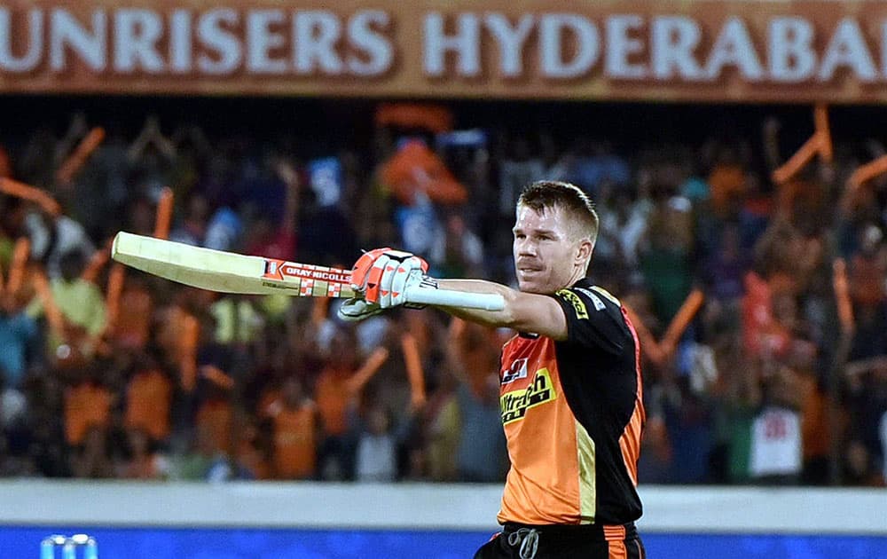 David Warner celebrates his century during their IPL match