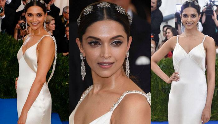 Deepika Padukone shimmers in a creamy satin slip by Tommy Hilfiger at Met Gala 2017! 