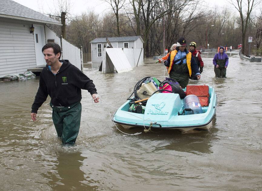 Residents use a paddleboat