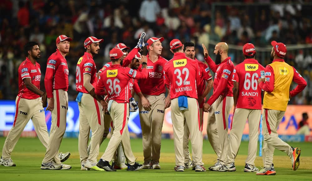 players celebrate the wicket of Kedar Jadhav