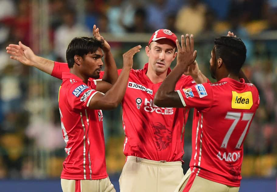 Sandeep Sharma celebrate with team mates after taking wicket of AB De Villiers