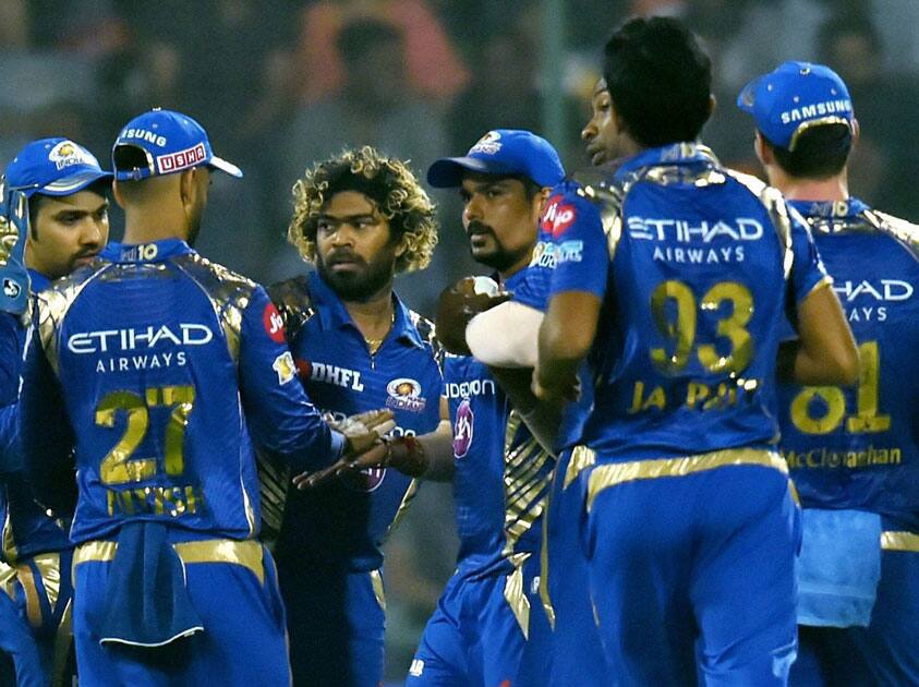 Lasith Malinga celebrates with team mates Lasith Malinga celebrates with team mates