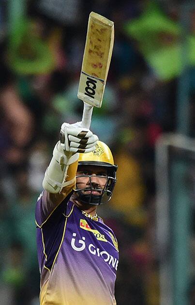 Sunil Narine celebrates his fifty runs during the IPL match