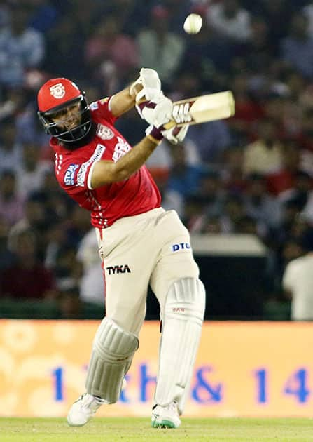 Hashim Amala of Kings XI Punjab plays a shot during the IPL match