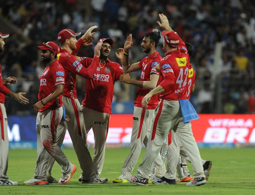 Kings XI Punjab players celebrates fall of a wicket