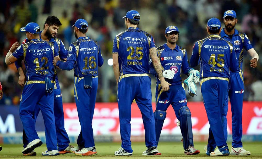 Mumbai Indians cricketers celebrate their win