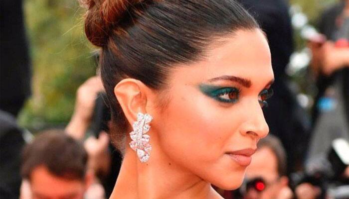 Cannes 2017: Deepika Padukone styles up with smoky eyes, thigh-high slit