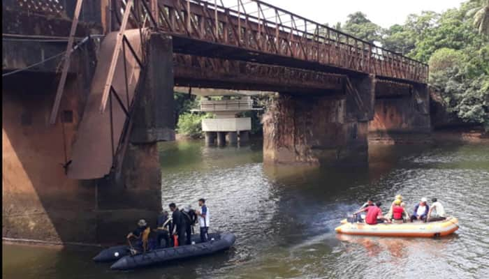 Onlookers watching a man trying to commit suicide fall into river as bridge collapses in Goa; 2 dead