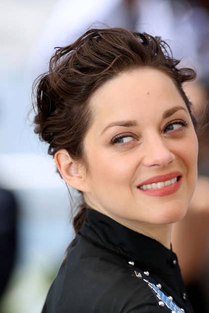 Actress Marion Cotillard poses during a photocall for the film 