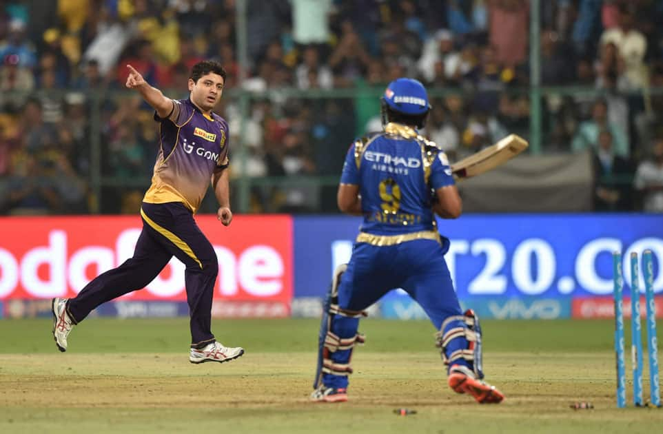 Kolkata Knight Riders Piyush Chawla celebrate the wicket of Ambati Rayudu during the IPL 10 Qualifier2 match between Kolkata Knight Riders and Mumbai Indians at Chinnaswamy Stadium in Bengaluru.