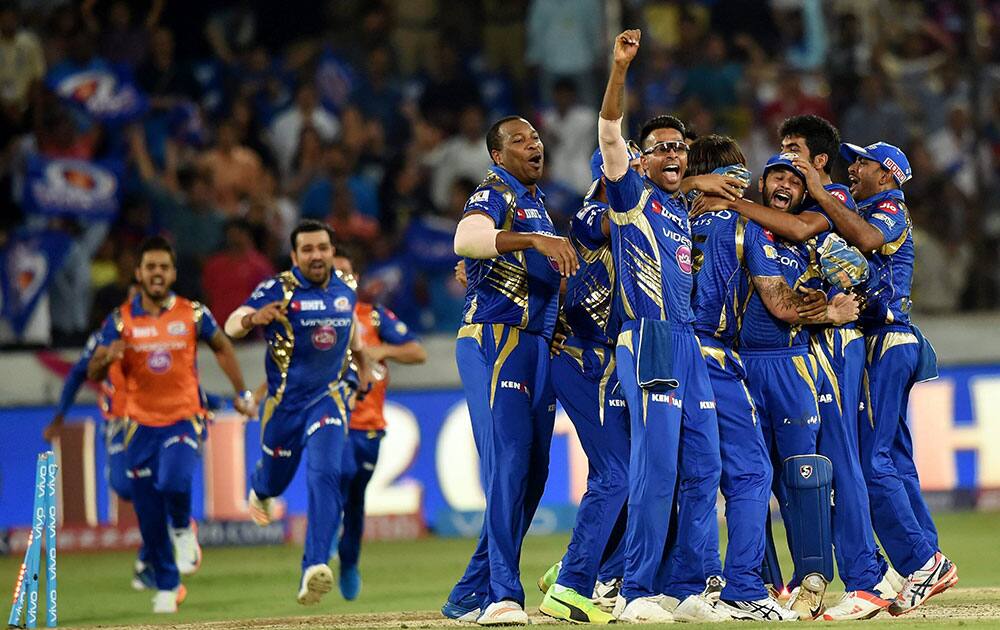 Mumbai Indians players celebrate after winning the IPL 10 Final match