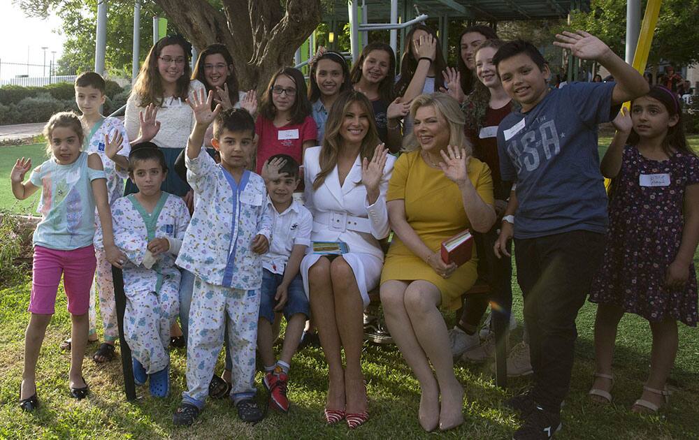 US first lady Melania Trump and Sara Netanyahu pose with children