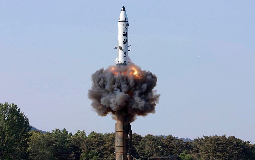 a solid-fuel Pukguksong-2 missile lifts off