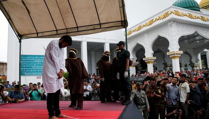 Two men publicly caned in Indonesia for having gay sex