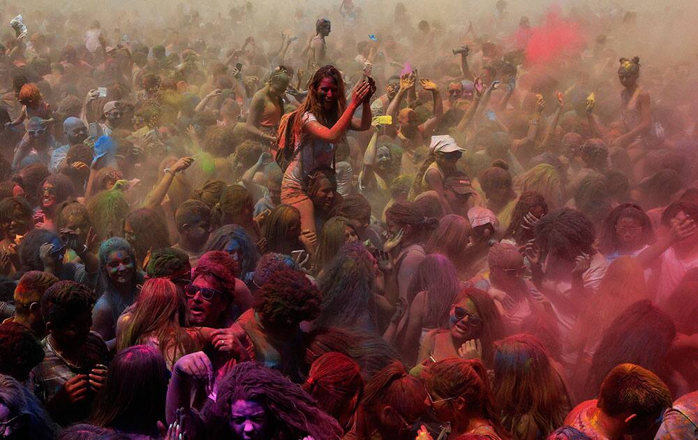 Visitors play the Holi Festival