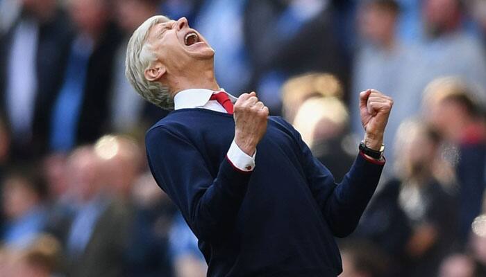 Arsene Wenger signs new two-year Arsenal contract, ends months of speculation about future