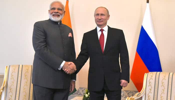 Russian President Vladimir Putin promises India will become full-fledged member of SCO in a week