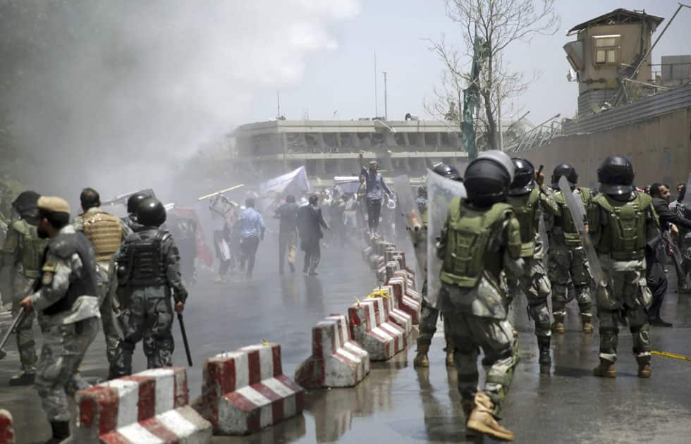 Protesters throw stones at police