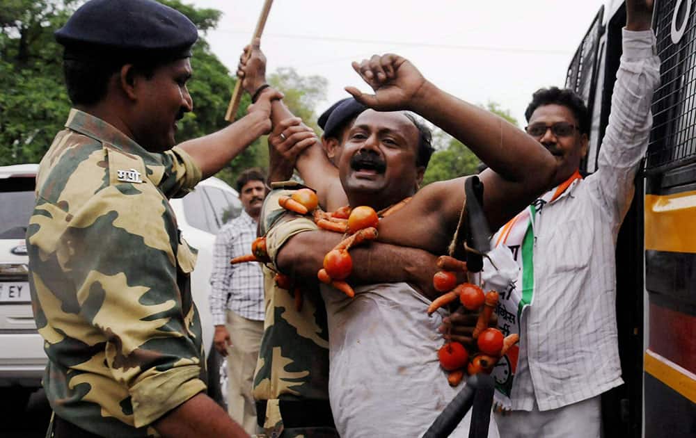 Police detain NCP farmers during a protest Police detain NCP farmers during a protest