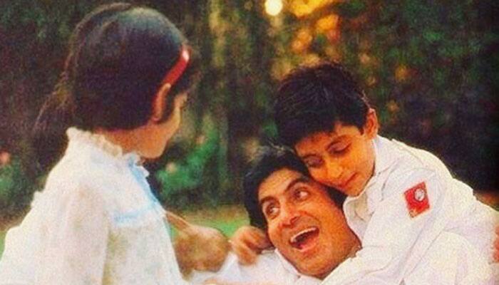 Abhishek Bachchan reminisces over childhood in this throwback pic with papa Bachchan!