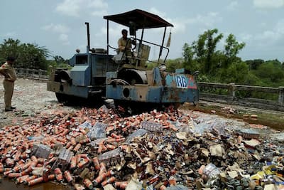 Seized Liquor bottles destroyed in Gujarat