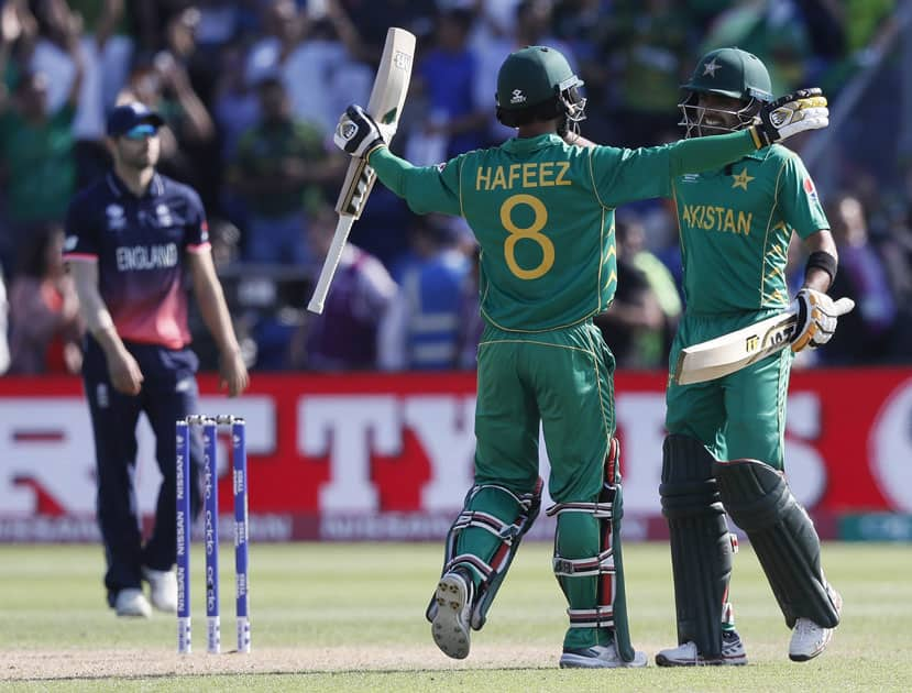 Pakistans Mohammad Hafeez and Babar Azam celebrate winning