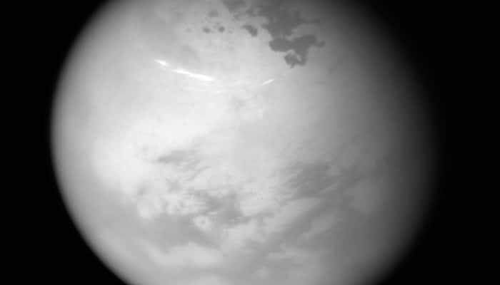 NASA&#039;s Cassini spots bright methane clouds, hydrocarbon seas on Saturn&#039;s moon Titan