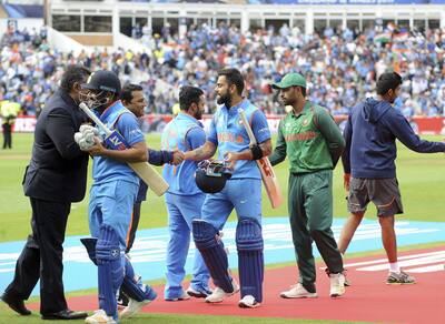 India and Bangladesh players shake hands at the end of semifinal match