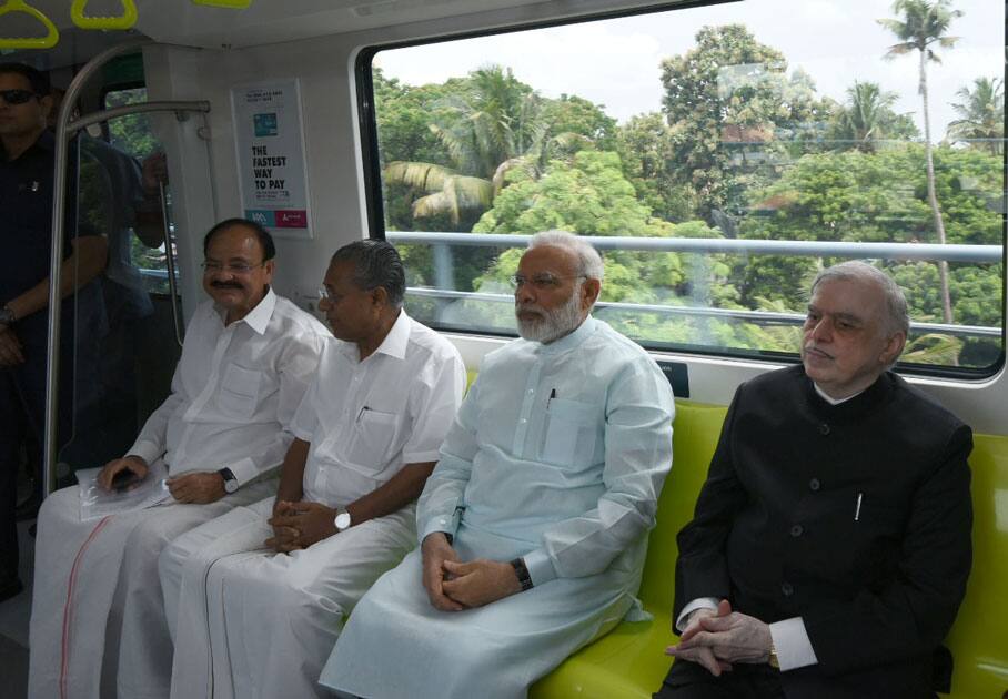 Narendra Modi and other dignitaries take a ride on Kochi Metro