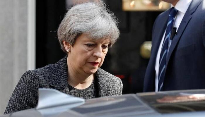 British PM Theresa May tries to quell public anger after deadly London fire