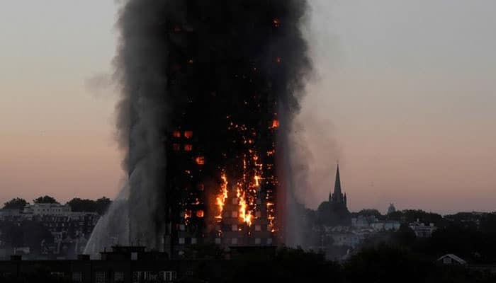 Railway track near London tower blaze closed at fire brigade&#039;s request