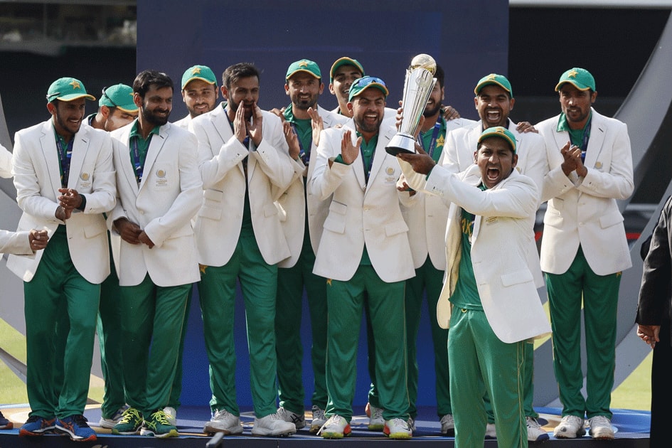 Pakistans captain Sarfraz Ahmed holds the trophy