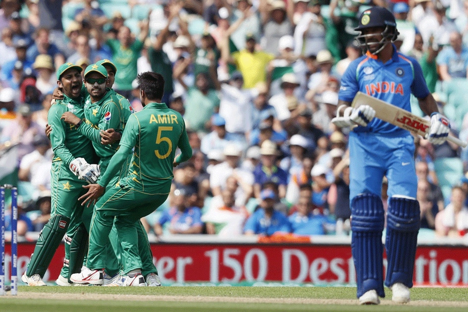 Pakistan celebrate the wicket of Shikhar Dhawan