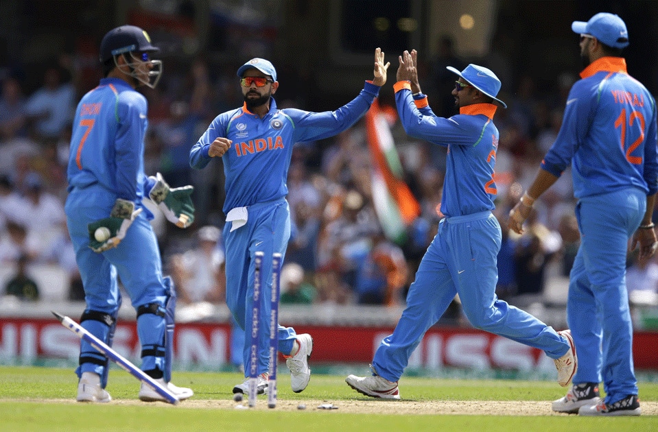 Indian players celebrate after dismissing Azhar Ali