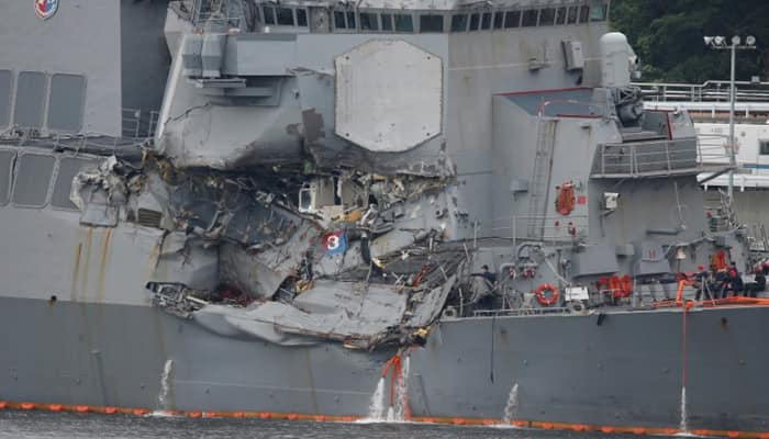 US Coast Guard interviews container ship crew after warship collision