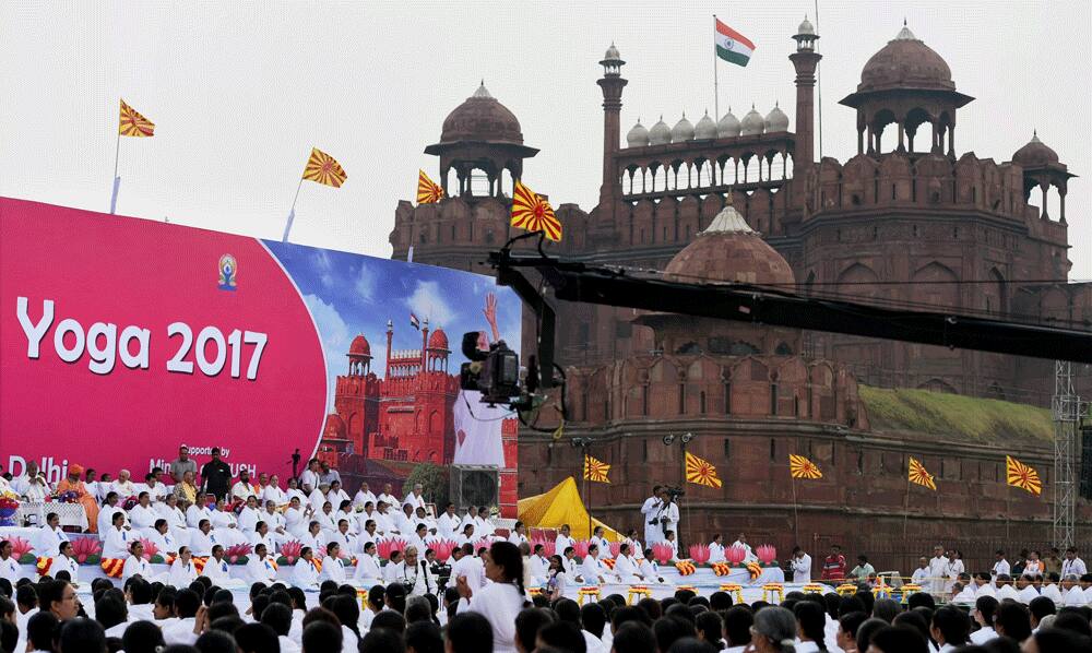 People participate in a yoga session