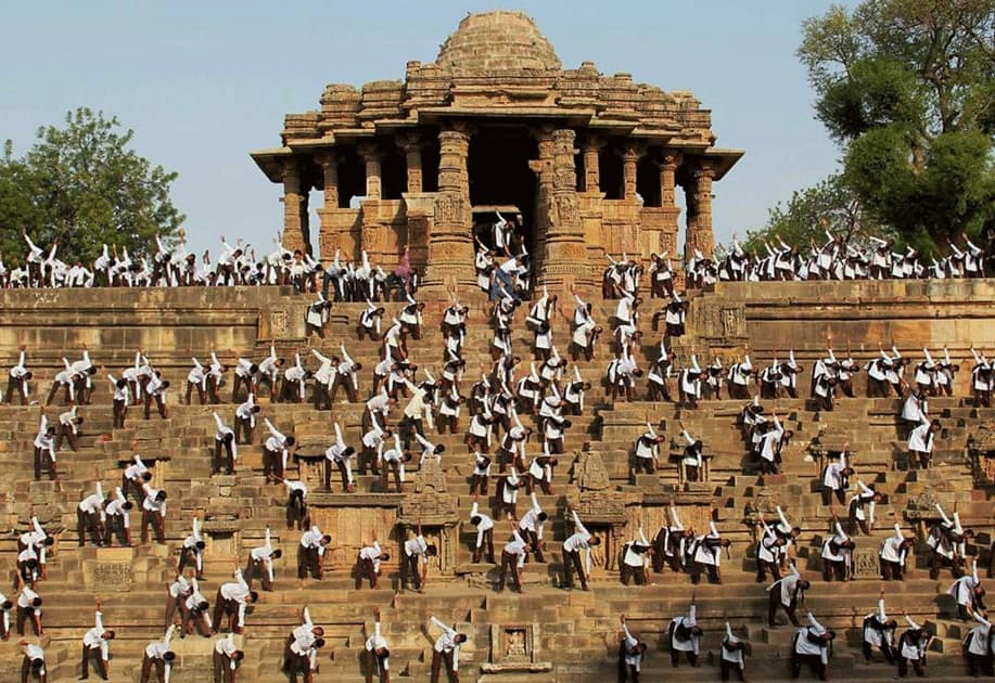 School Children perform yoga