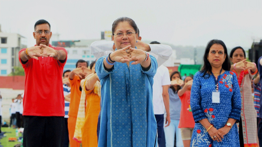 Rajasthan Chief Minister Vasundhara Raje take part in a yoga session