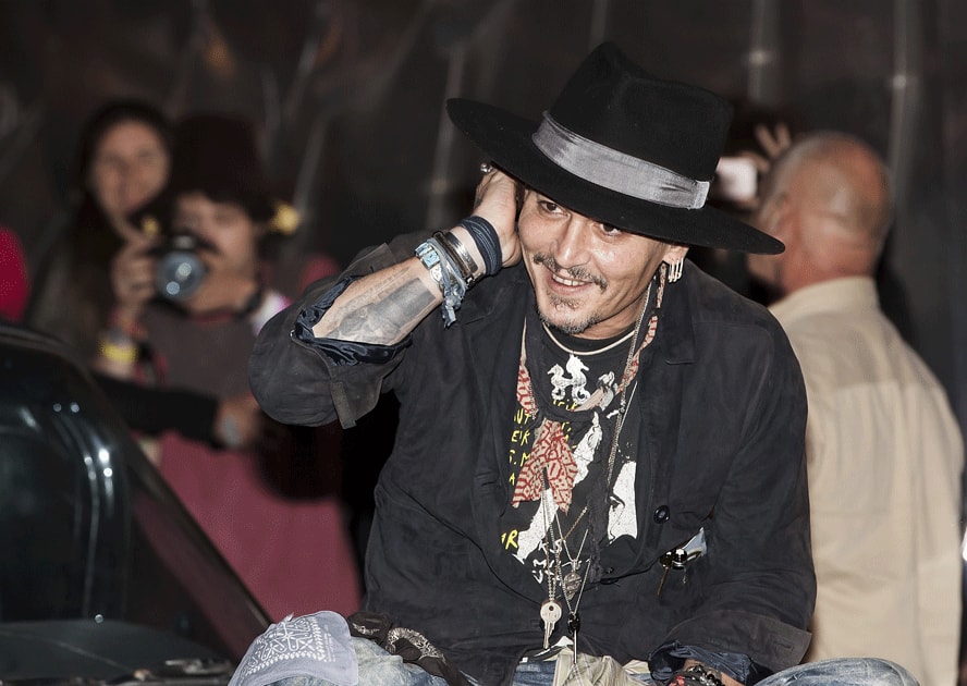 Johnny Depp arrives at the Glastonbury music festival