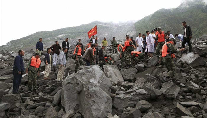 Over 140 people feared buried in China landslide